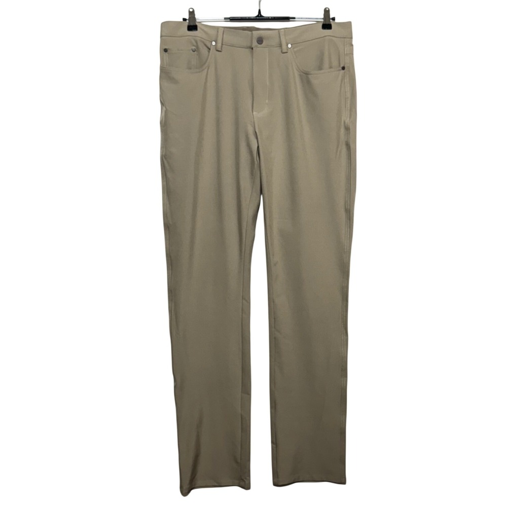 Greg Norman Pants Mens Measures 34X33 Tag 34x34 Tan Performance Stretch Golf